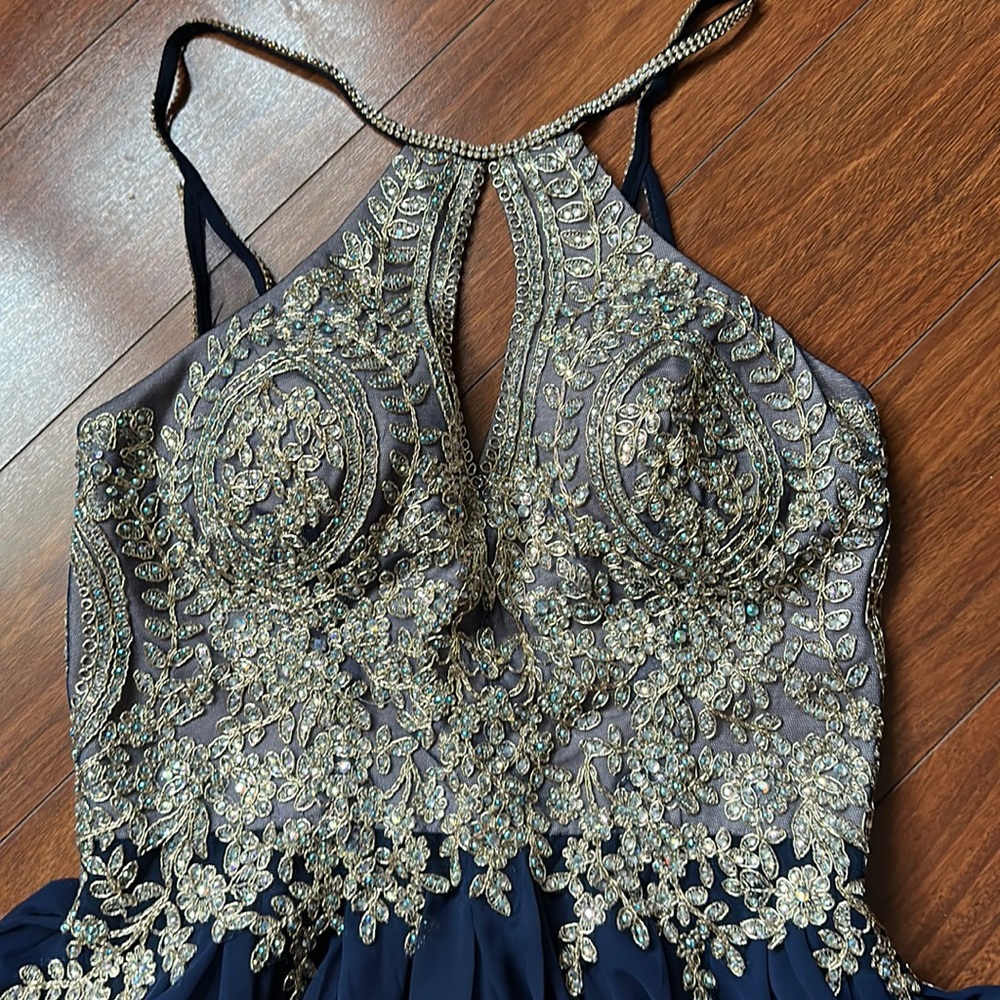Stunning navy and gold short prom dress.